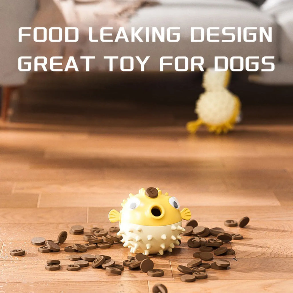 Yellow fish-shaped vinyl dog chew toy with textured surface and squeaker for aggressive chewers
