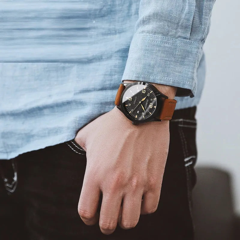 Men's automatic mechanical watch with leather strap showing black shell beige dial and silver army green options