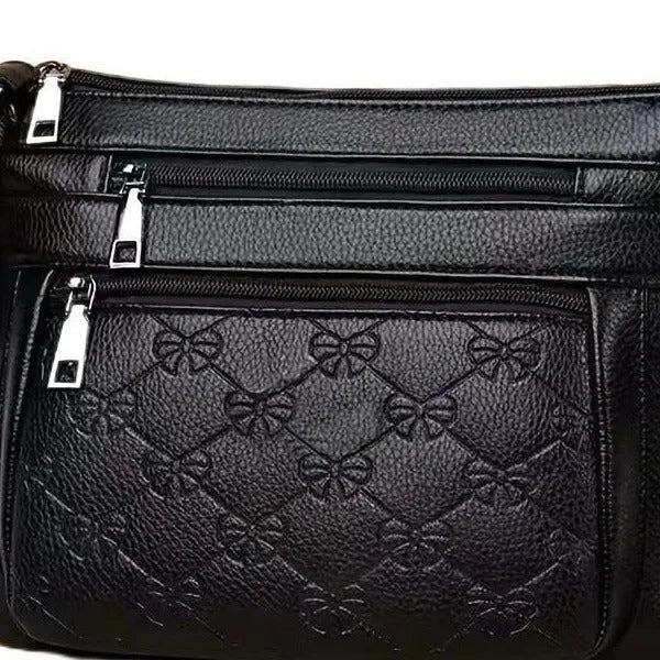 Black PU women's crossbody messenger bag with horizontal square shape and mobile phone compartment