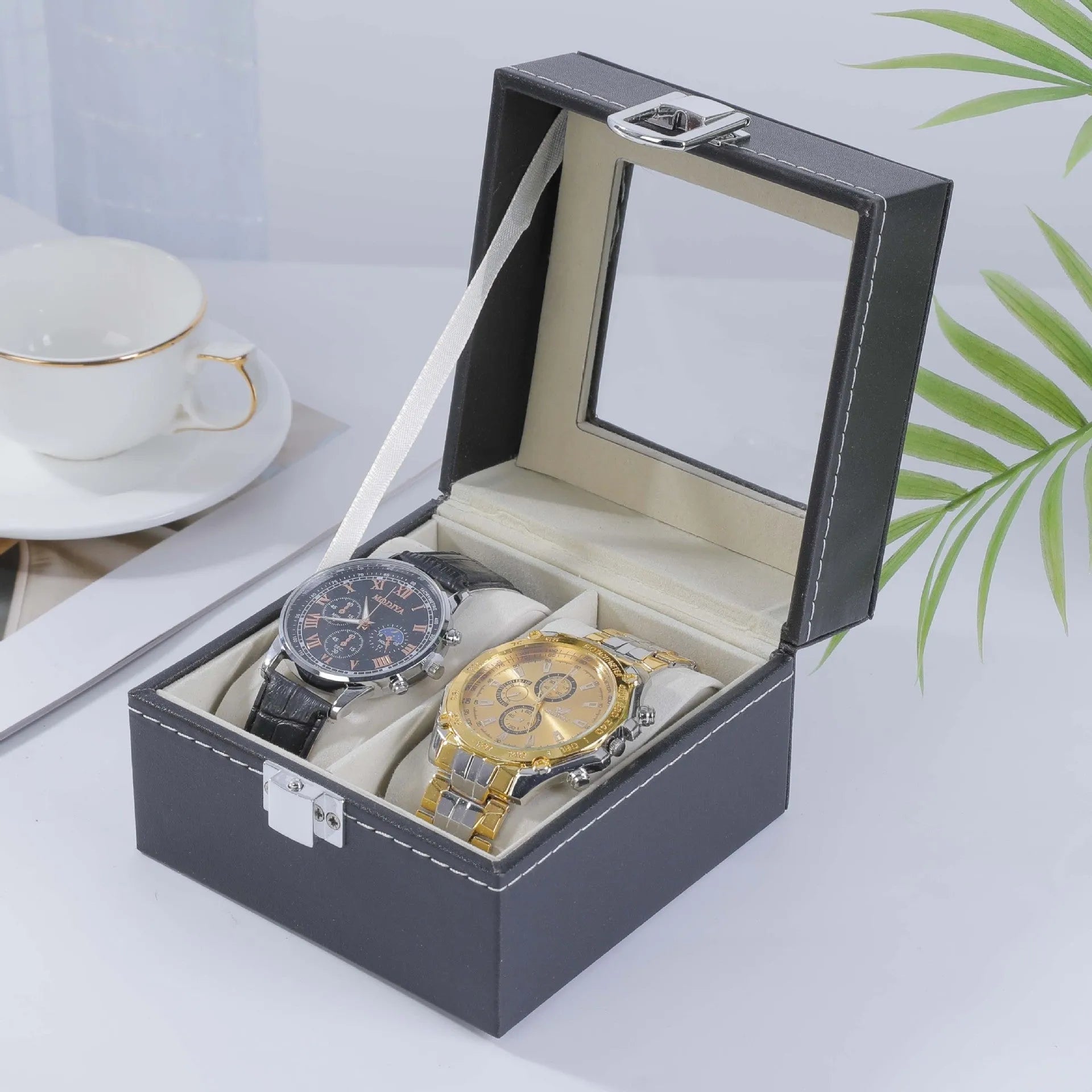 Grey high-grade leather watch storage box with clear dustproof lid showing multiple watch slots inside.