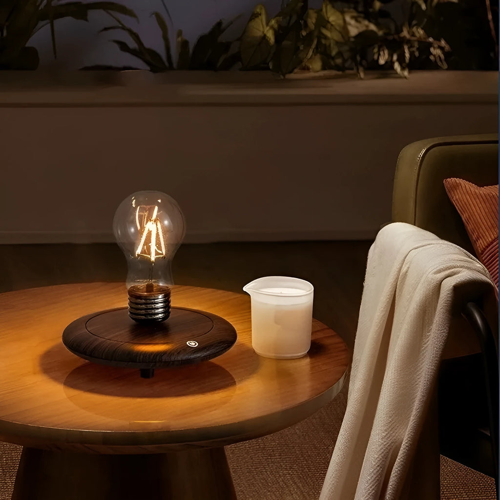 Suspended bulb night lamp on black wood grain base measuring 11cm for desktop decoration