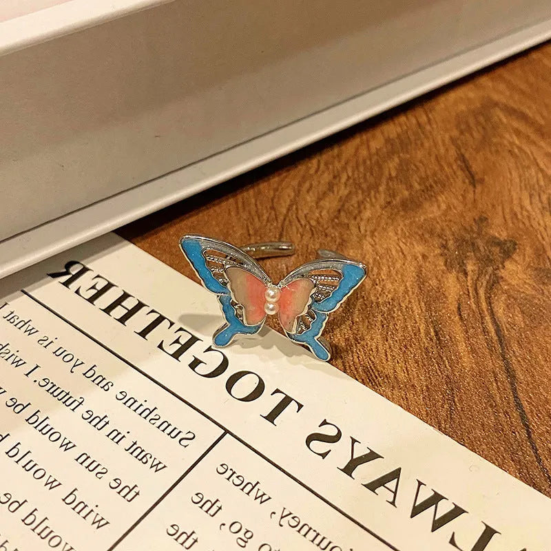 Copper Chinese butterfly women's ring showing creative design with oil dripping treatment finish