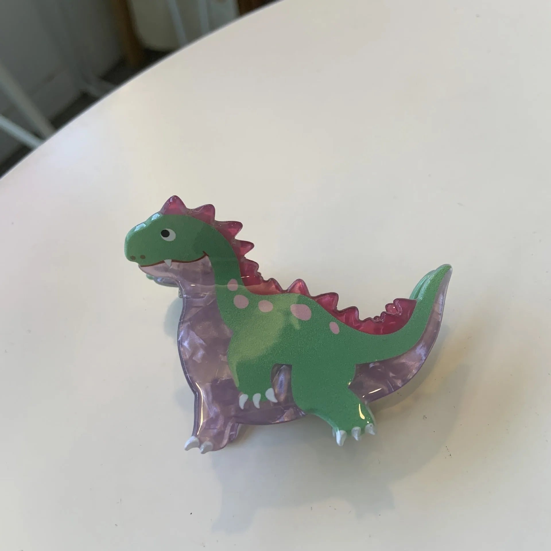 Acrylic dinosaur jaw hair clip in pink pterosaur colour with grip fastening mechanism