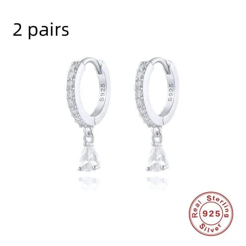 Geometric water drop earrings in Sterling Silver with electroplated gold finish and purple diamond stones