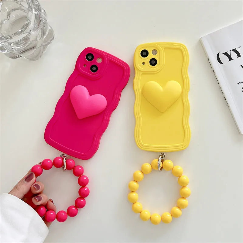 Silicone wavy edge phone case with love ball chain in Rose Red for iPhone 14 Pro Max