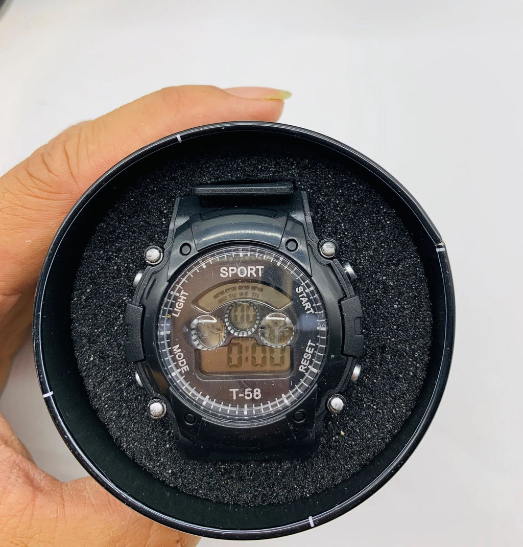 Children's digital electronic watch with large dial, silicone strap, showing alarm and time display
