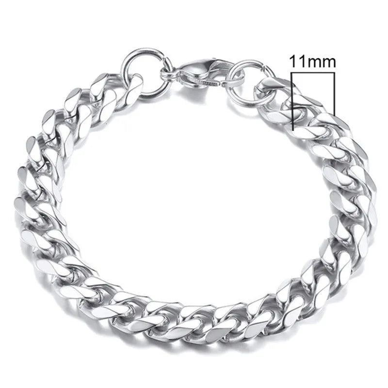 Six-sided geometric Cuban link metal bracelet in gold, black, and steel colour finishes.