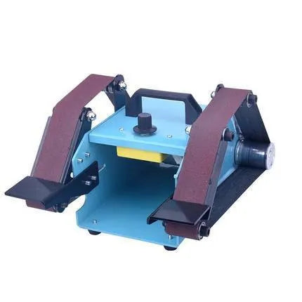 Blue desktop dual-axis belt sander with abrasive belt, shown on a workshop bench.
