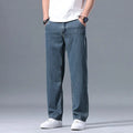 Man wearing light blue loose straight-leg lyocell blend casual jeans.