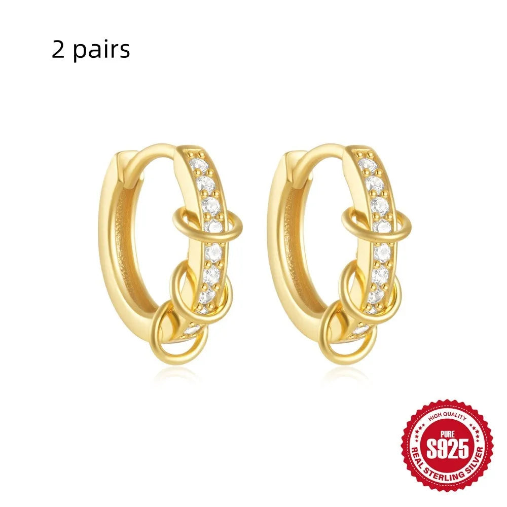 Sterling silver geometric stud earrings with small round diamond accents in gold or silver electroplated finish