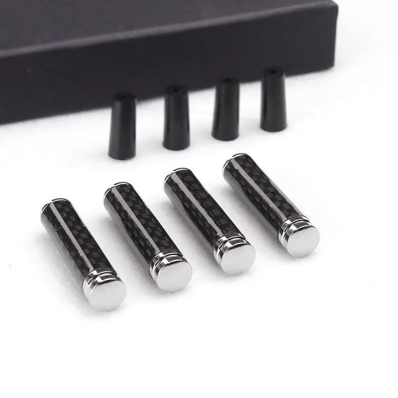 Four carbon fibre and metal car door handle decorative covers for direct replacement installation.