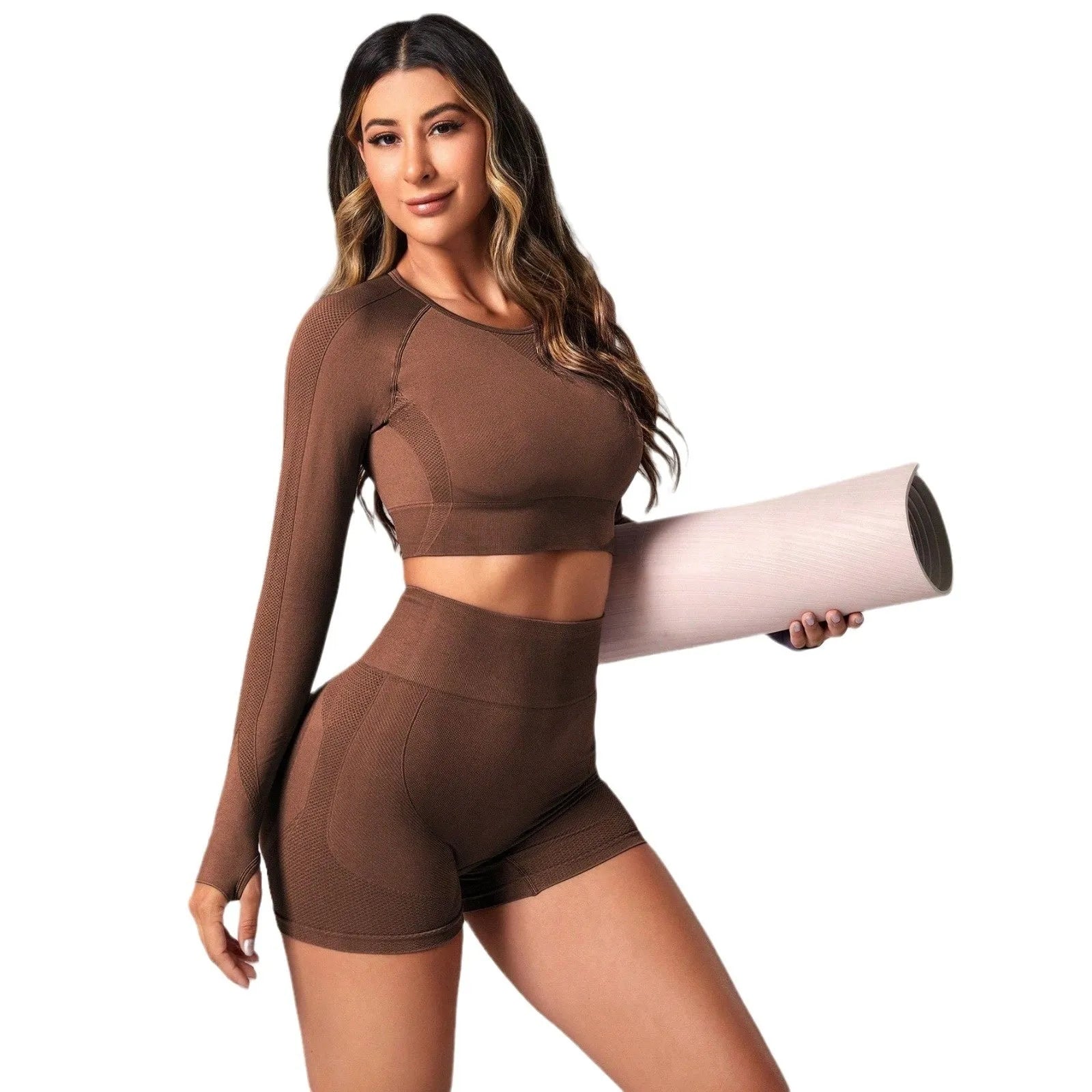 Women's yoga suit set in black colour showing high-waist pants and long sleeve pullover top