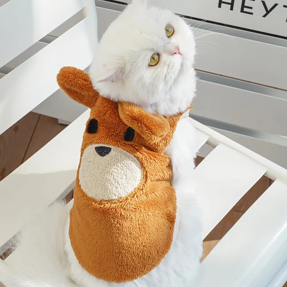 Cream fleece-lined pet dog clothes with brown bear ears on a white background, side view