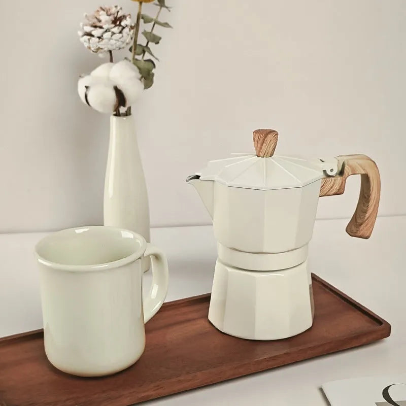 Manual grinding machine set six-piece moka pot kit in beige with grinder, cup, jar, brush, spoon and filter paper