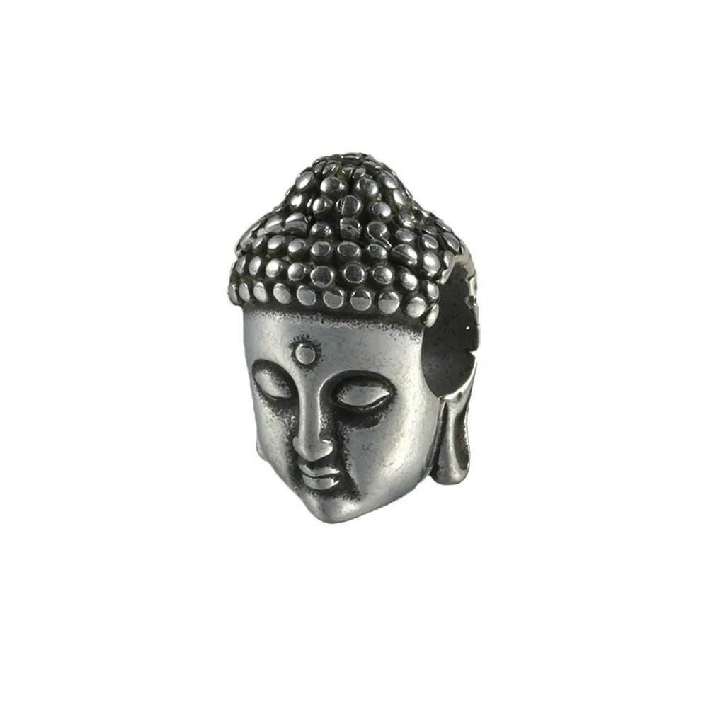 Geometric stainless steel earrings combining hollow skull and Buddha motifs with electroplated finish