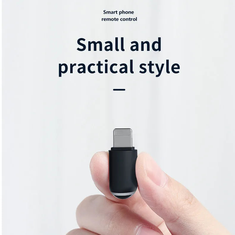 Black universal infrared remote control emitter capsule for smartphone Lightning, Type-C, and Micro USB ports.