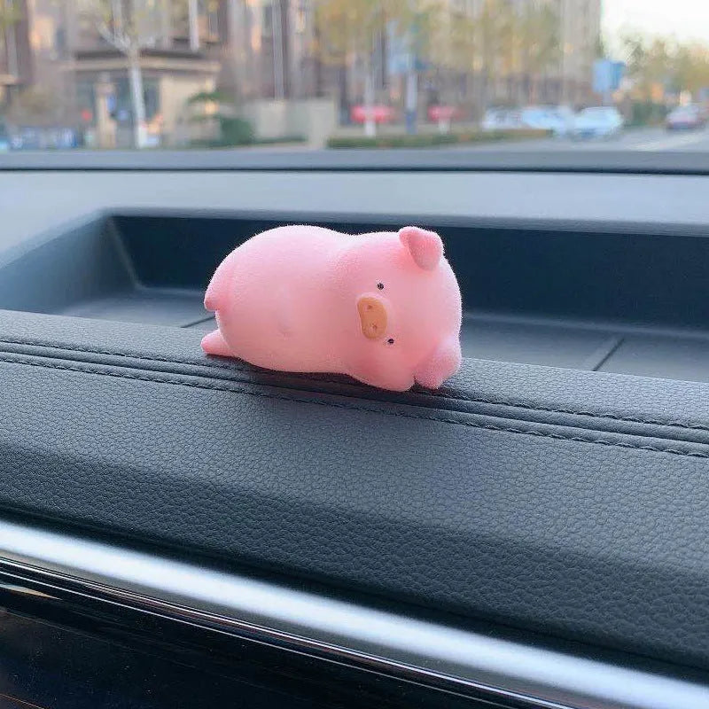 Cute resin cartoon pig car decoration accessory for dashboard.