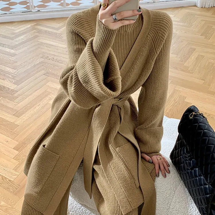 Women's knitted three-piece set showing wide-leg pants, sweater top, and cardigan in solid colour with leather stitching