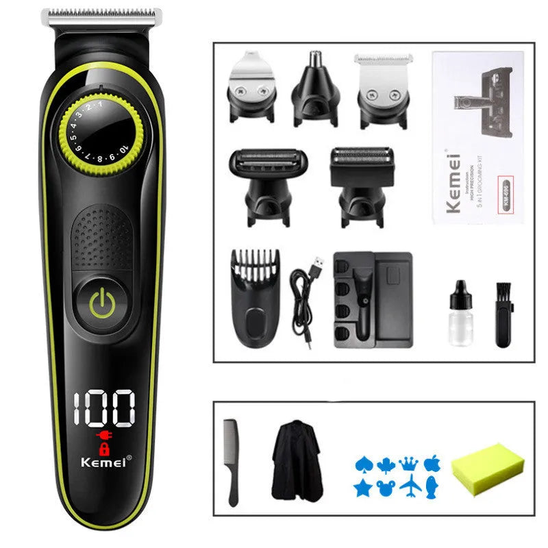 Black KM-696 USB rechargeable electric hair clipper set with stainless steel blades and accessories on a cloth