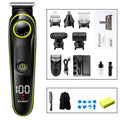 Black KM-696 USB rechargeable electric hair clipper set with stainless steel blades and accessories on a cloth