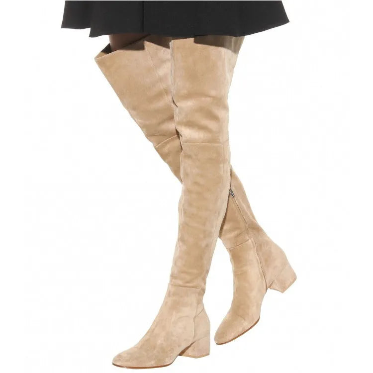 Grey women's flat over-the-knee suede boots with a pointed toe and low rubber heel.