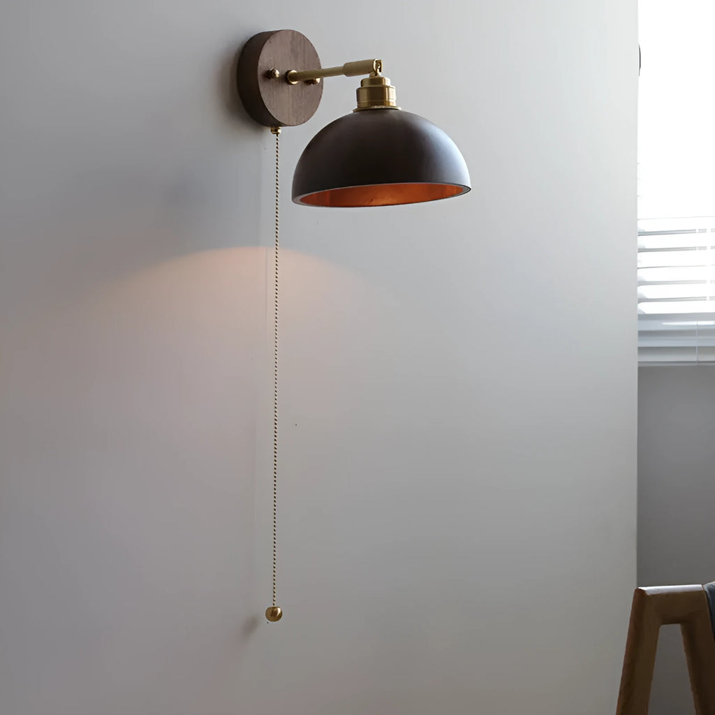 Nordic style wooden wall lamp with walnut finish mounted beside a bed