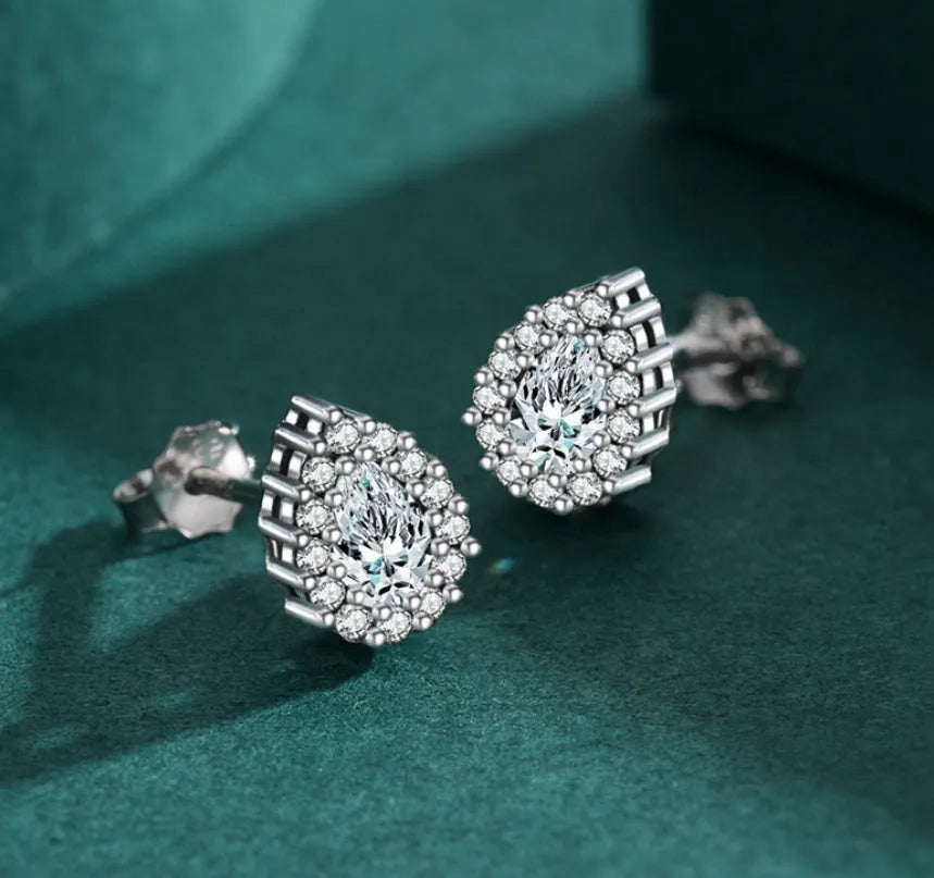 Women's silver drop ear studs with 925 sterling silver and diamond treatment process