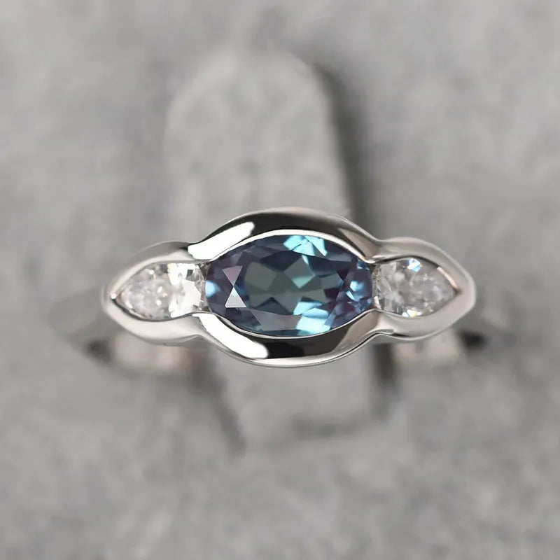 Women's geometric ellipse copper ring with white gold plating and zircon stones in UK sizes 6 to 10