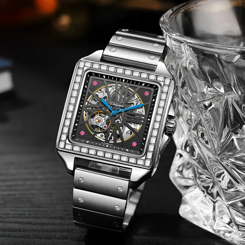 Men's square automatic watch with a diamond-studded dial on a black steel bracelet.