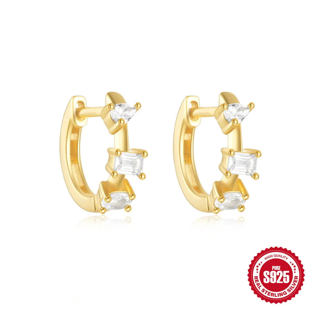 Sterling silver geometric stud earrings with small round diamond accents in gold or silver electroplated finish