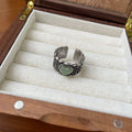 Adjustable heart-shaped ring with wide moon face in white or green colours