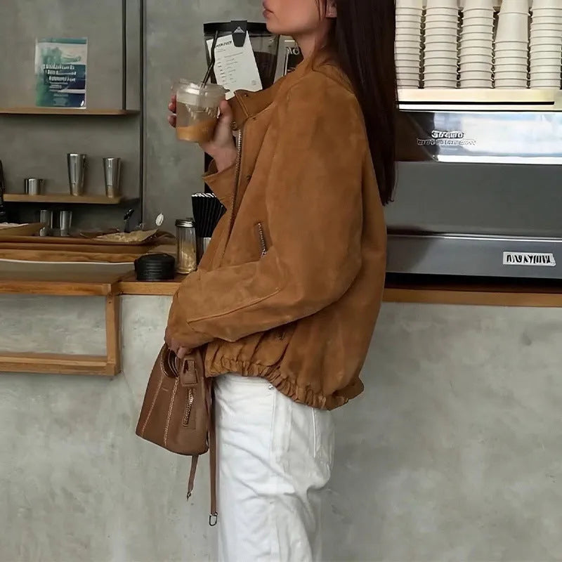 European and American retro style loose fit solid colour polyester jacket with long sleeves.