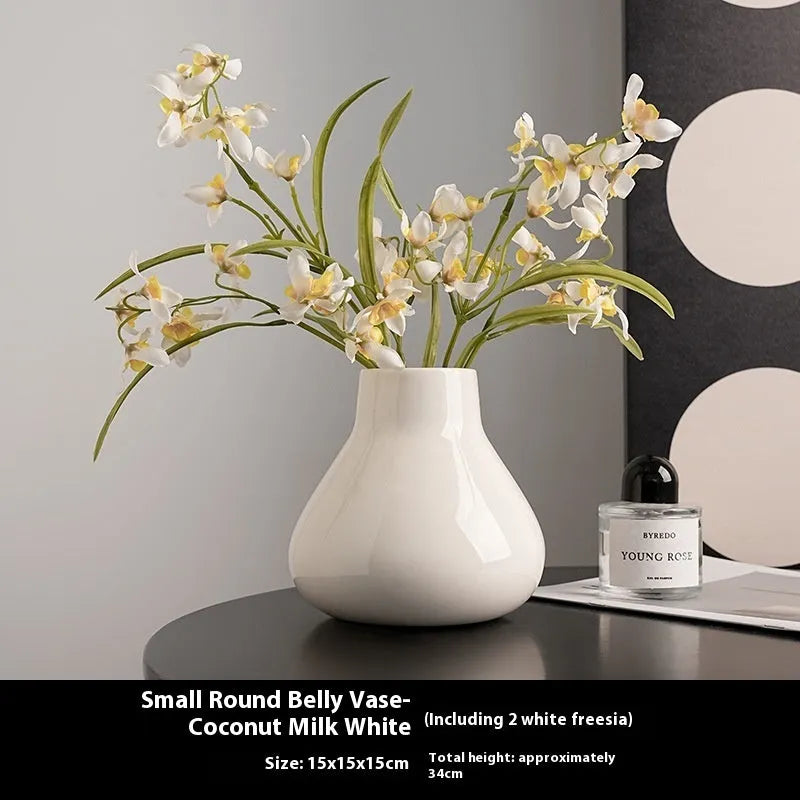 Black and white ceramic round belly French high sense decorative vases with artificial flower arrangements