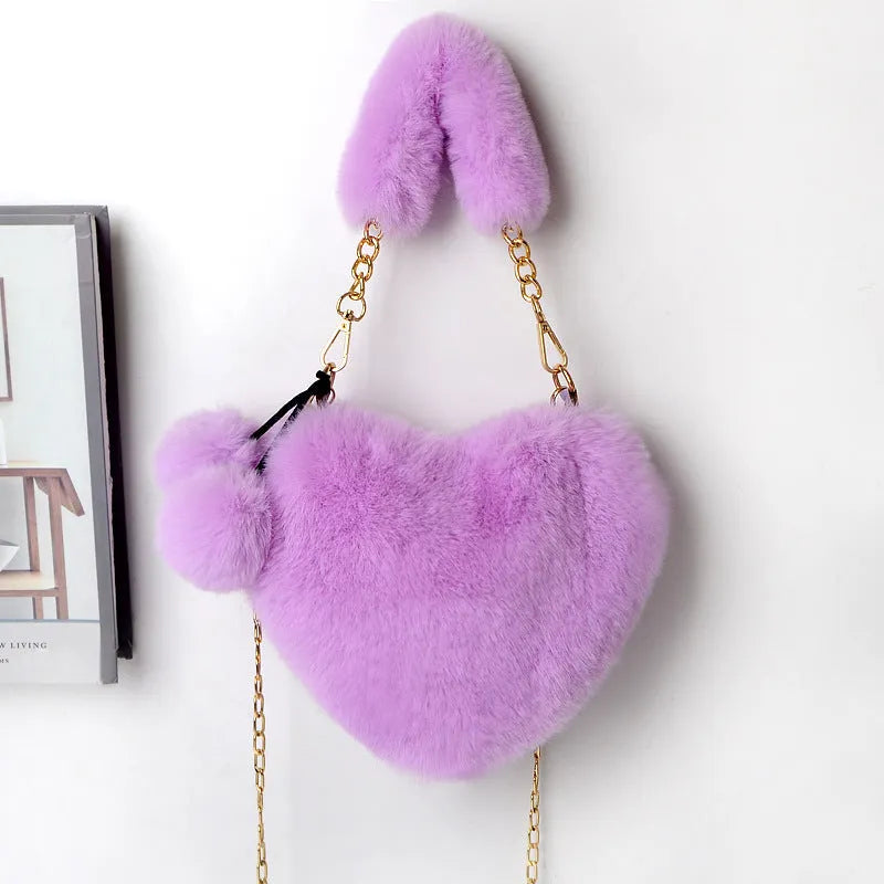 Heart-shaped women's plush handbag with soft texture and detachable shoulder strap in medium size