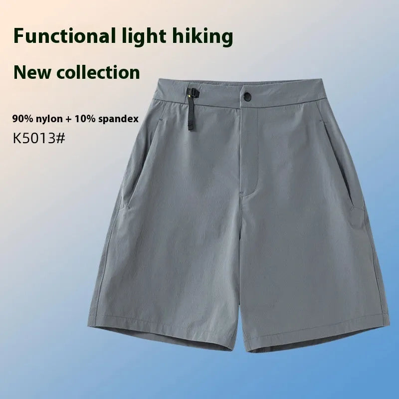 Men's quick-drying sports shorts in Army Green colour on a grey background.