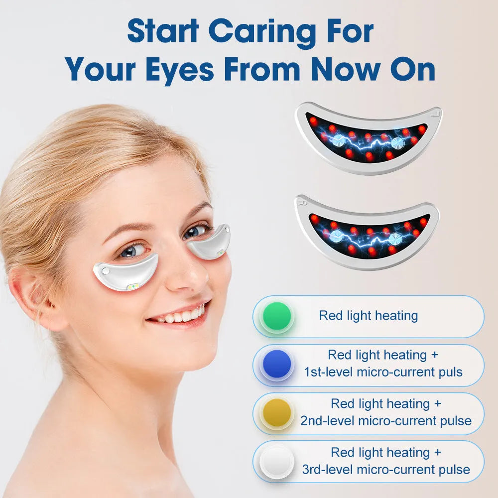 White wireless red light EMS eye and facial massager device on a table