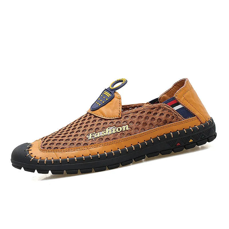Men's brown mesh casual shoes with round toe and rubber sole on grey background