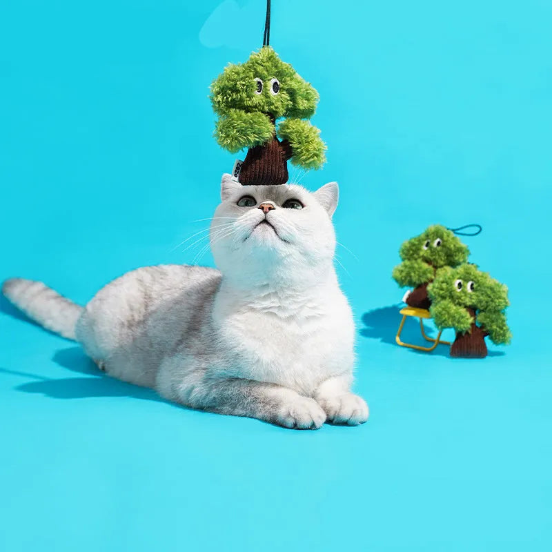 Pine tree shaped cat mint toy with dangling tease stick for chewing and interactive play