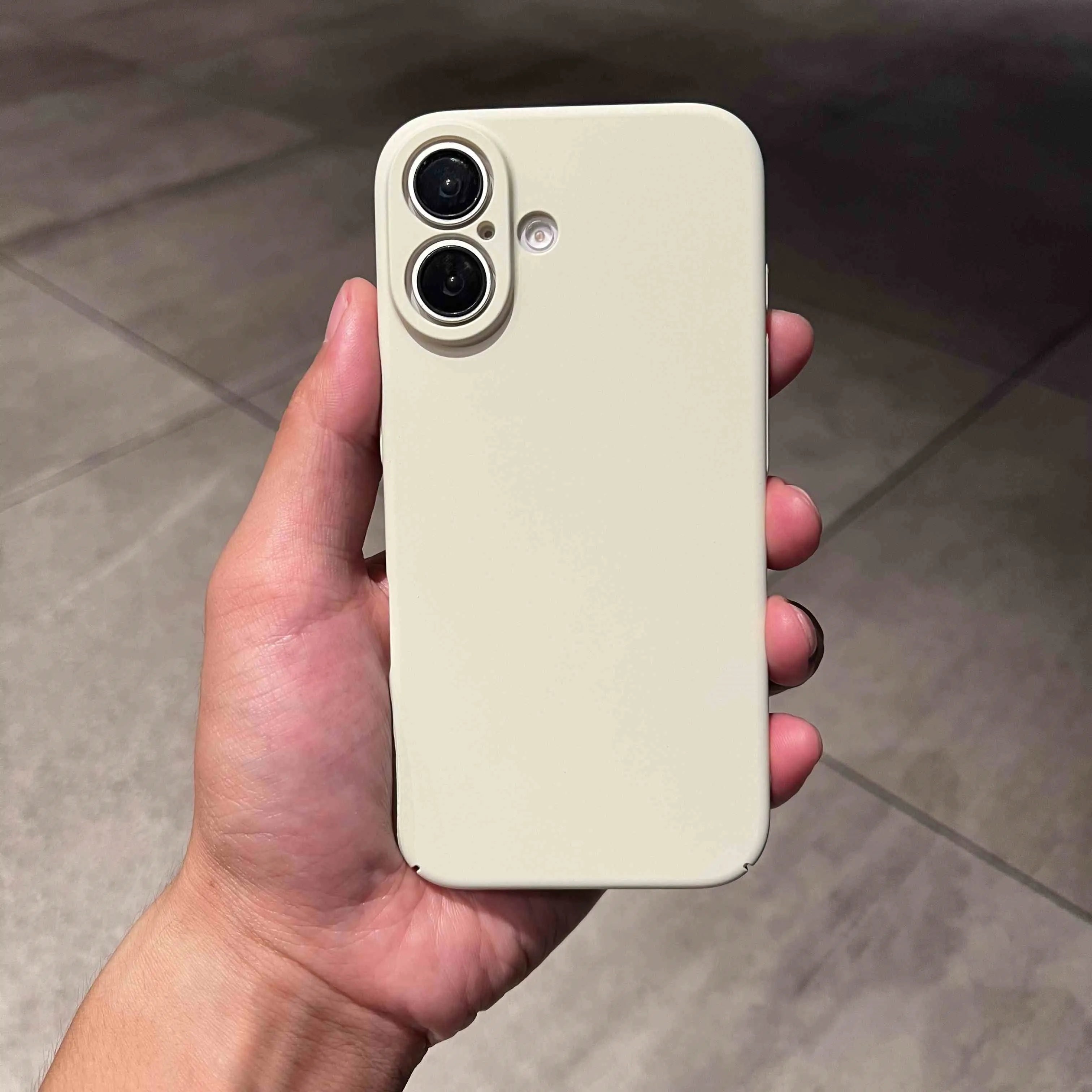Ultra thin frosted plastic phone case for iPhone 15 Pro Max in black showing camera cutout