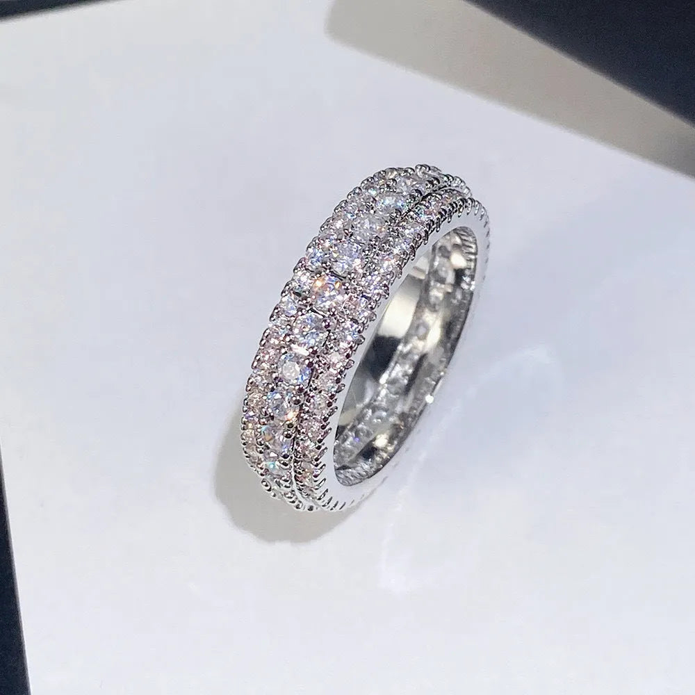 Geometric unisex ring with triangular zircon stone in white gold, yellow gold, or two-tone finish