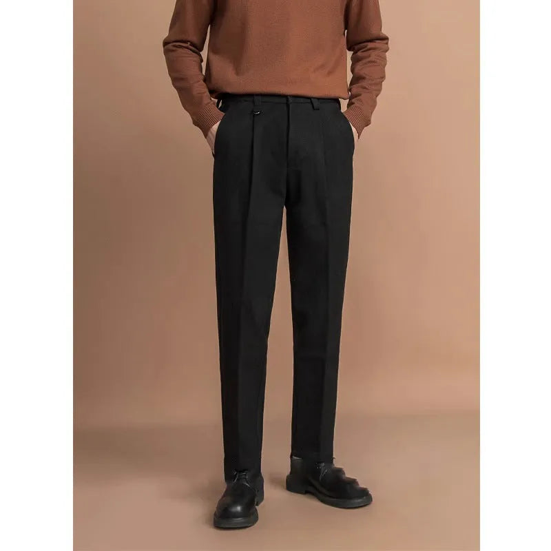 Men's straight leg polyester trousers in black on a hanger, business casual style