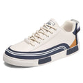 Men's beige and green canvas casual shoes with mesh ventilation sections and flat heels
