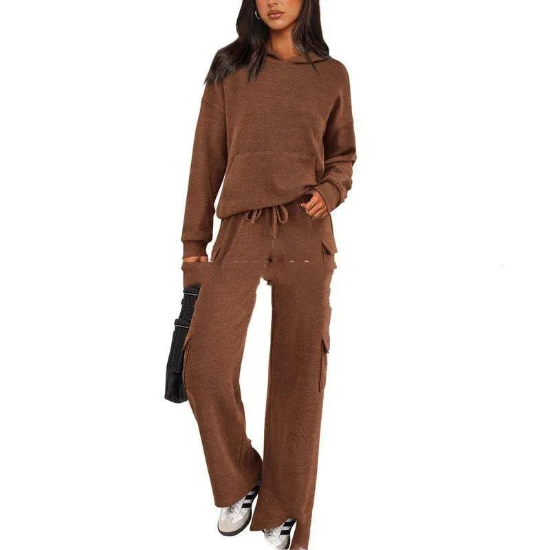 Women's polyester leisure sports suit set showing long sleeve top and matching trousers in multiple colour options