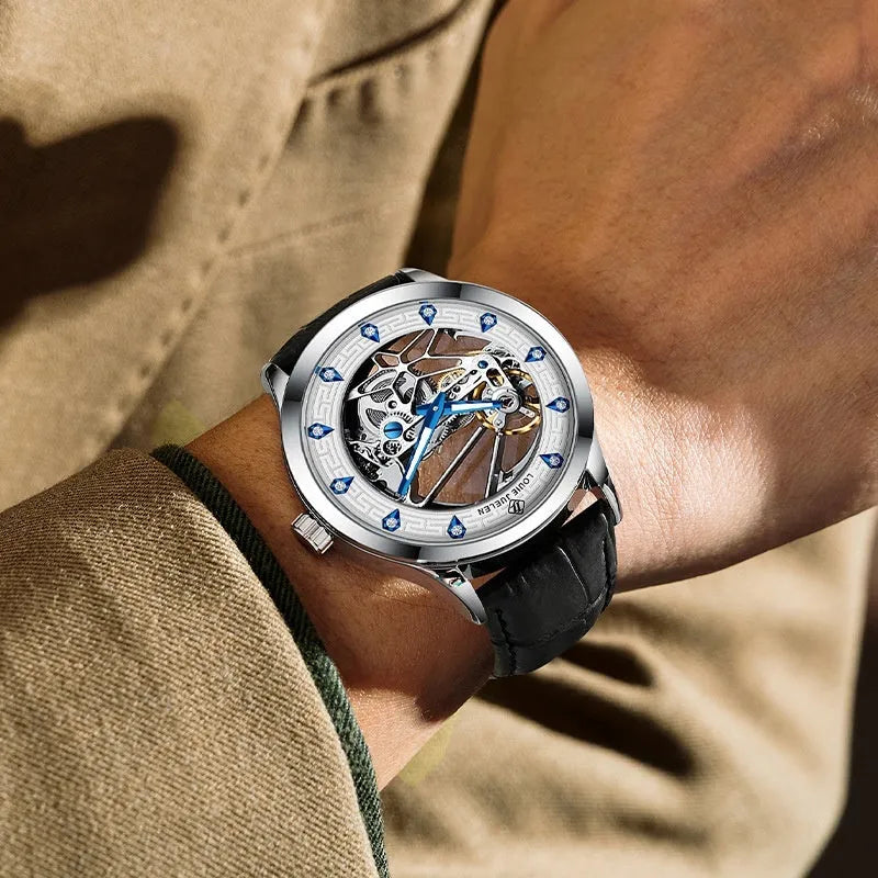 Men's silver stainless steel mechanical watch with white dial, blue luminous hands, and a black leather strap.