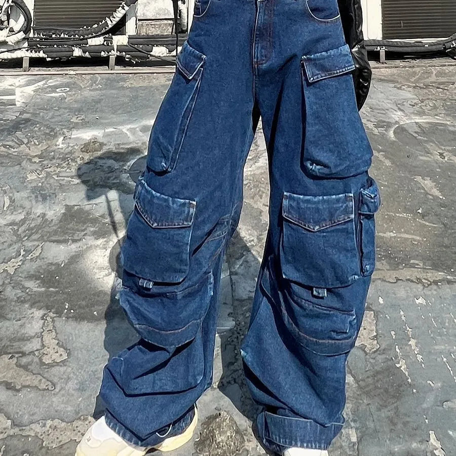 Dark blue women's distressed wide-leg jeans with a high waist and multiple utility pockets.