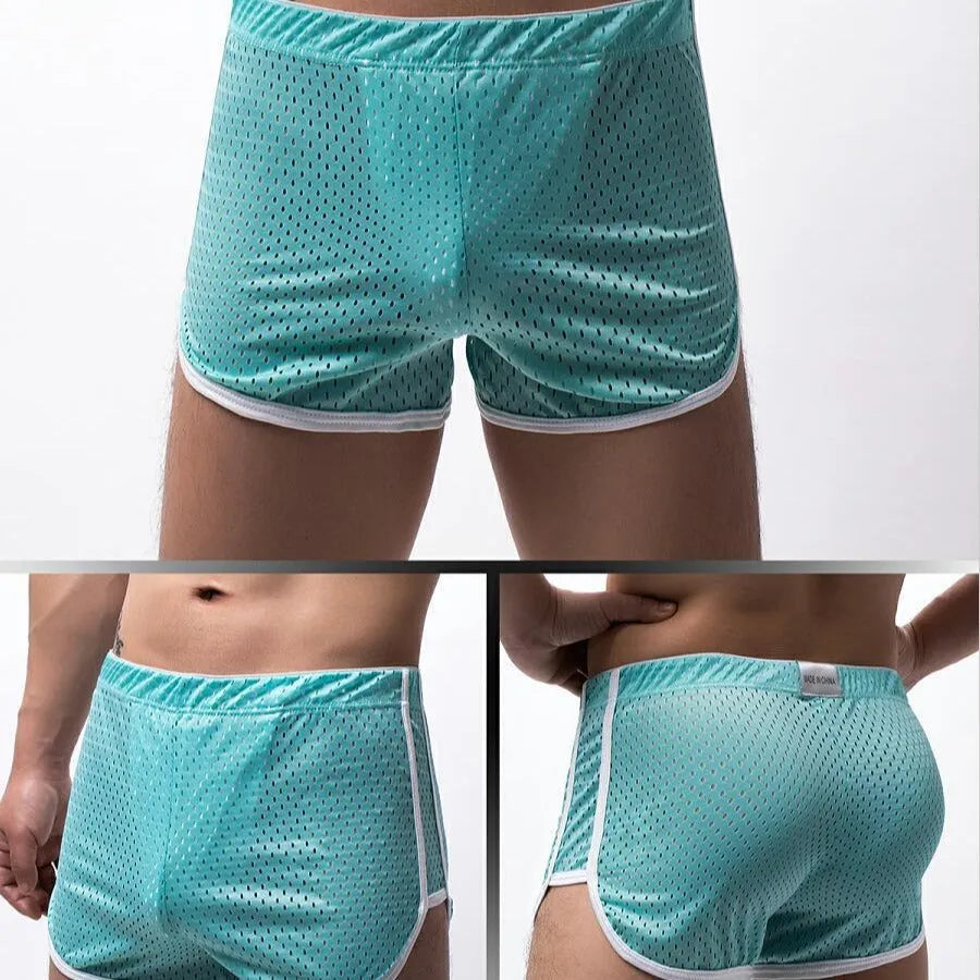 Men's black three-point boxer shorts made from a cotton and nylon blend fabric.