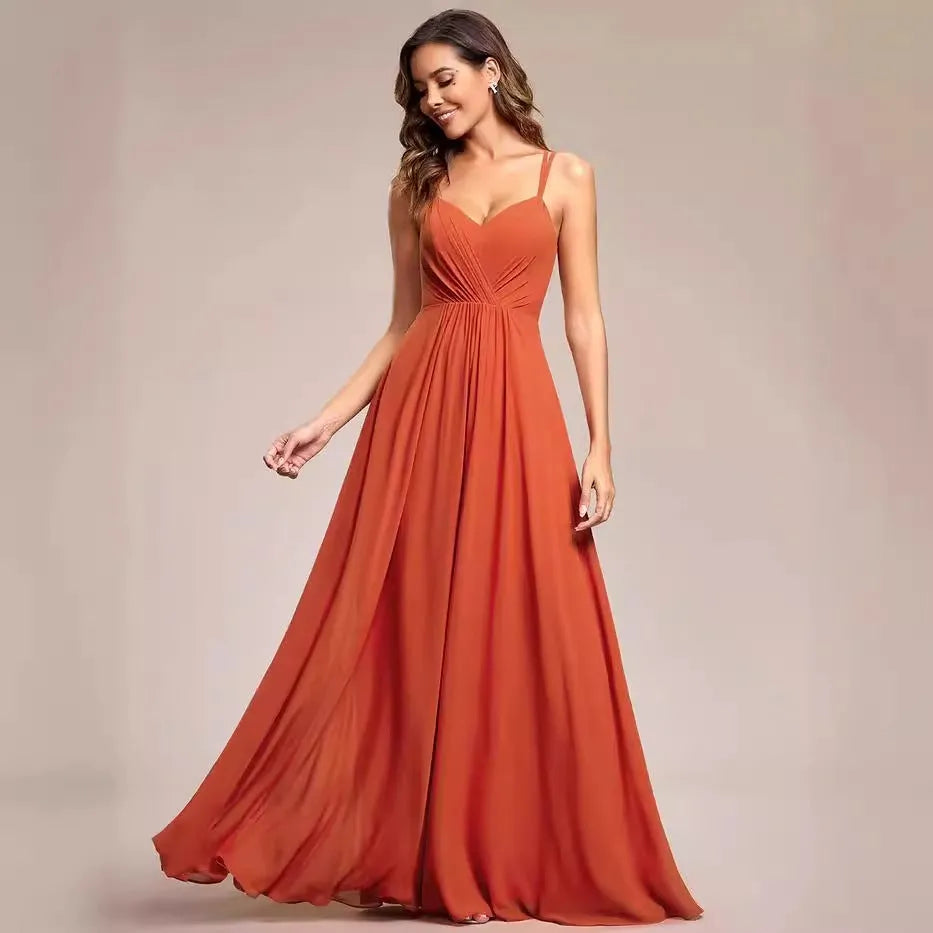 Women's light green sleeveless A-line banquet dress with long pleated skirt on a hanger.