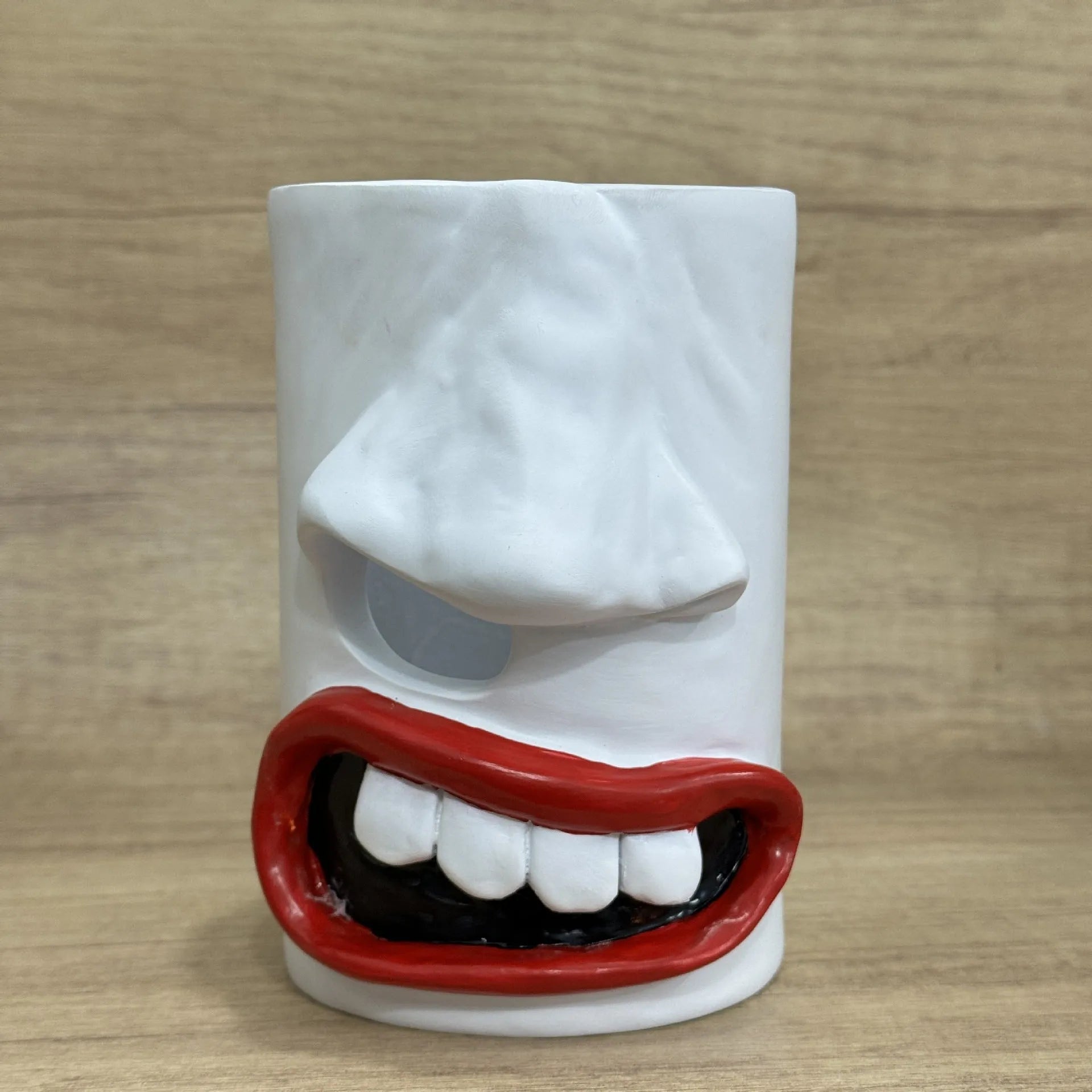 Creative resin desktop ornament with humorous tissue paper holder design measuring 8.5cm by 14.6cm
