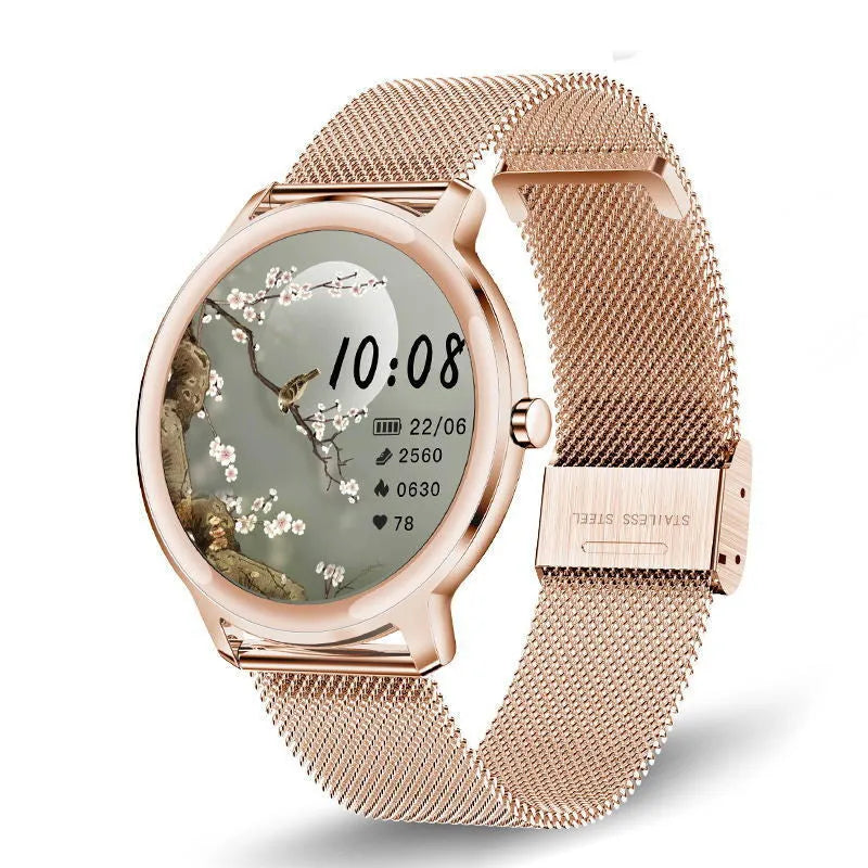 Women's silver smart watch with stainless steel wristband showing 1.3-inch touch screen display