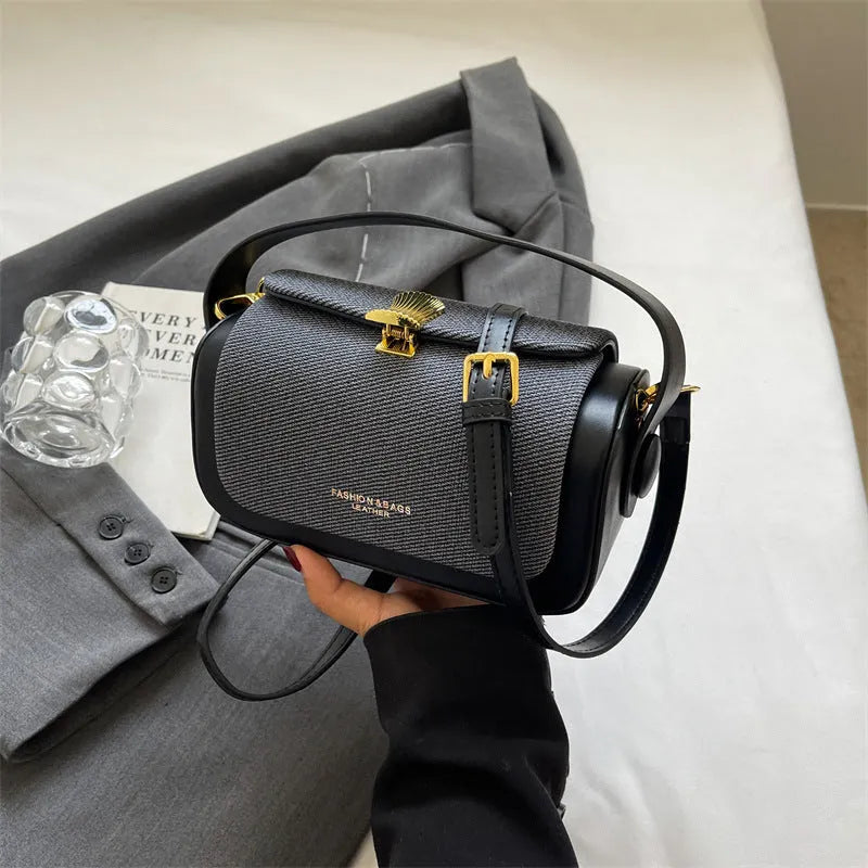 Women's black PU messenger bag with horizontal square shape and crossbody strap